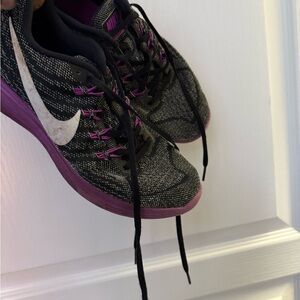 Nike Black and Purple Athletic Shoes with Mesh Upper